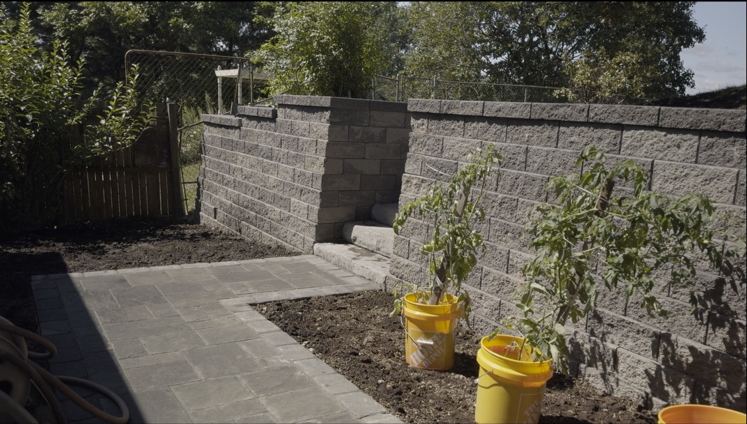 Retaining wall with paver walkway